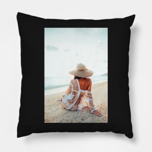 Elegant Woman Sitting on Beach and Watching the Ocean Pillow