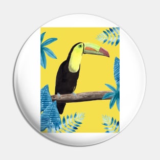 Toucan with tropical leaves and a yellow background Pin