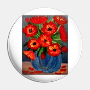 A  lovely boutique of abstract poppie  in a blue vase . Pin