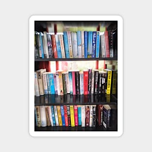 Bookcase in an old red phone box Magnet