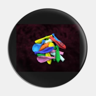 colorful balloons on wooden table Pin