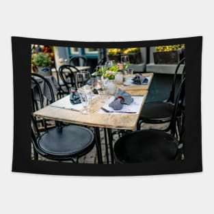 Outdoor dining table in the Dutch city of Maastricht Tapestry