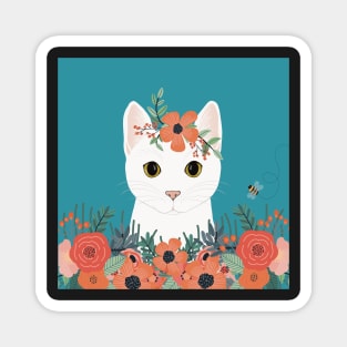 The cute white cat queen is watching you from the flowerbed Magnet