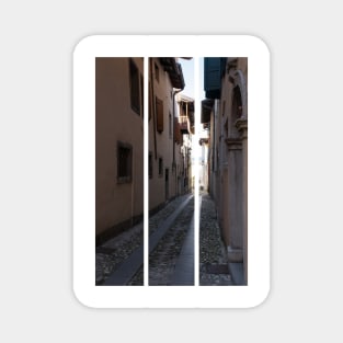 North Italy Life in the center of the lombard medieval city. Walking through narrow streets and walls. Sunny summer day. (vertical) Magnet