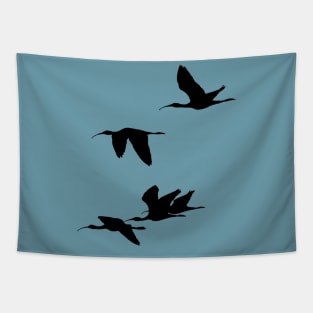 Silhouette of Glossy Ibises In Flight Tapestry