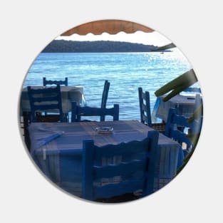 Scenic view on Mediterranean sea from Greek restaurant with blue chairs Pin