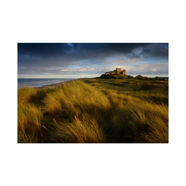 Bamburgh Castle at sunset by chrisdrabble