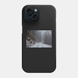 Foggy road in the forest Phone Case