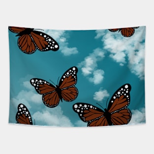 Butterflies in blue sky Tapestry