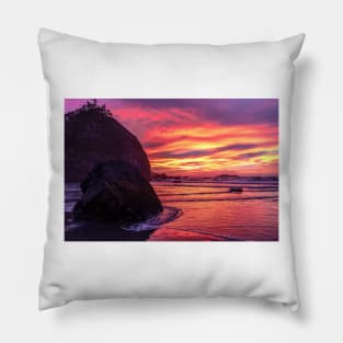 Vibrant sunset on rocky coast Pillow