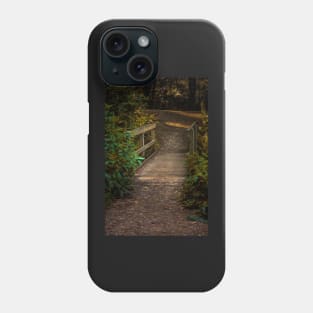 A Wooden Footbridge In The Woods Phone Case