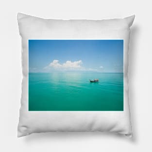 Aerial view of fishing boat on emerald sea Pillow