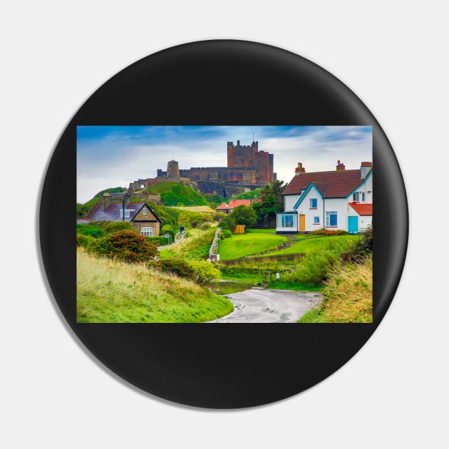 View of Bamburgh village and castle, Northumberland, UK Pin by Itsgrimupnorth