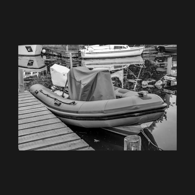 Inflatable dinghy moored up on the Norfolk Broads by yackers1