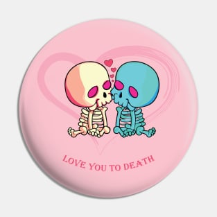 Love You to Death for Valentines Day. Skeletons kissing surrounded by hearts Pin