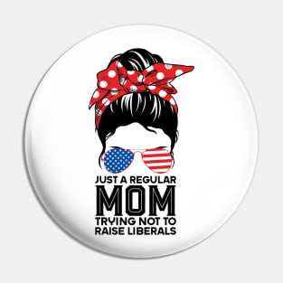 Just a regular mom trying not to raise liberals tshirt woman messy bun american flag Pin