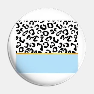 Black and white leopard print on light blue, golden lining Pin