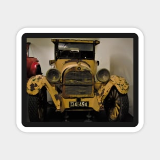 The yellow rusty vintage car Magnet