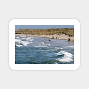 people on the beach at Bamburgh - Northumberland, UK Magnet