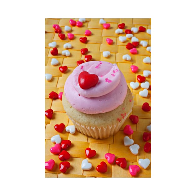 Pink cupcake with candy hearts by photogarry