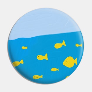 A school of yellow fish swimming in the blue sea Pin