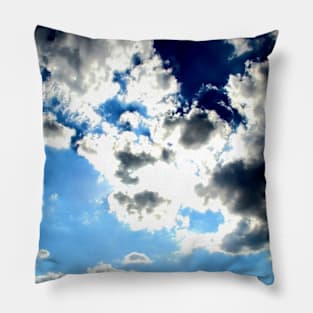 Peaceful scenery with powerful sunbeams making their way through fluffy clouds in the blue sky Pillow