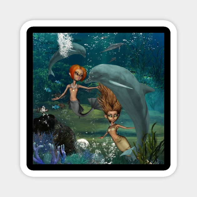 Little mermaids playing with a dolphin Magnet by Nicky2342