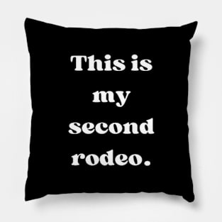 "This is my second rodeo." in plain white letters - cos you're not the noob, but barely T-Shirt Pillow