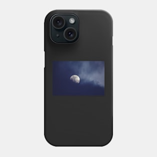 Moon behind dark blue clouds Phone Case