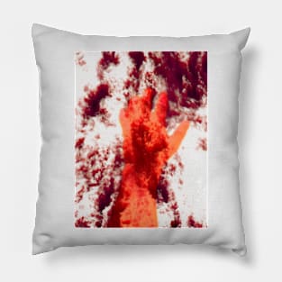 Digital collage and special processing. Psychedelic. Hand reaching on top of some bizarre surface. White, red and orange. Pillow