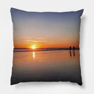 Silhouetted couple enjoys sunset at beach Pillow