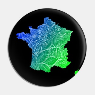 Colorful mandala art map of France with text in blue and green Pin