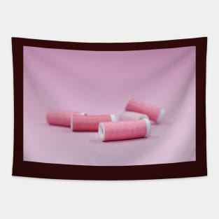 Pink pastel sewing threads on a pink background Tapestry