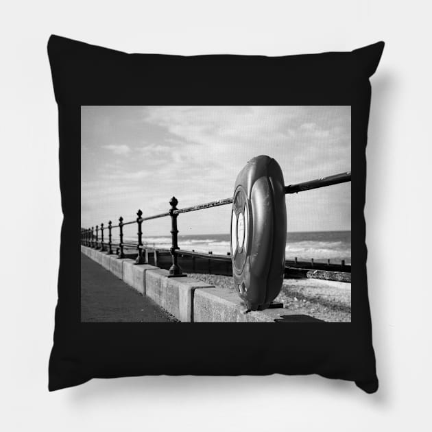 Life saver ring on the promenade at Cromer beach, Norfolk Pillow by yackers1