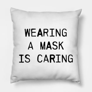 Wearing a mask is caring Pillow