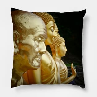 3 Buddhas seated, Thailand. One depicted as an old man. Pillow