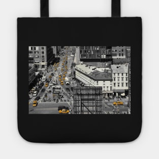 Black and white photograph of a busy Manhattan intersection in the Meatpacking District, with highlighted yellow cabs Tote