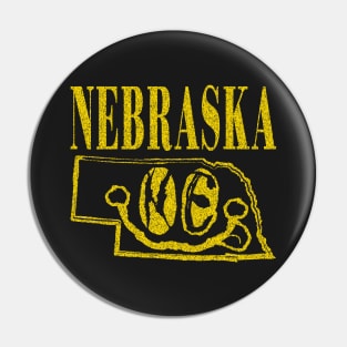 Nebraska Grunge Smiling Face Black Background Pin