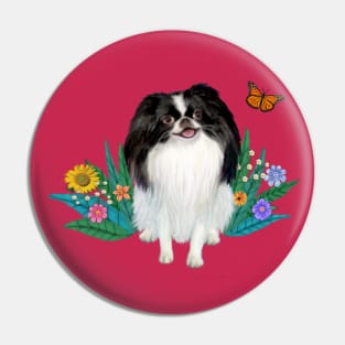 A Japanese Chin Watches a Butterfly Pin