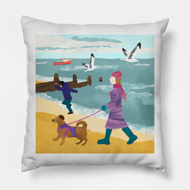 Paper cut collage of lady walking dog on Whitstable beach in the winter Pillow by NattyDesigns