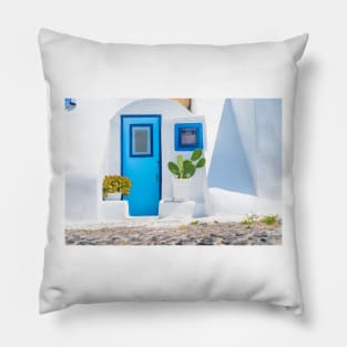 White exterior Mediterranean style entrance with blue door Pillow