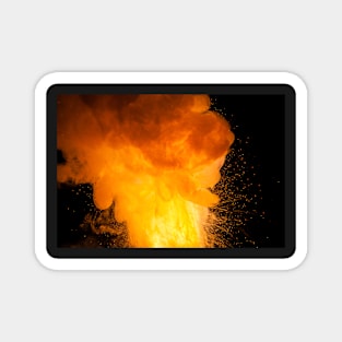 Realistic fiery explosion, orange color with sparks on a black background Magnet