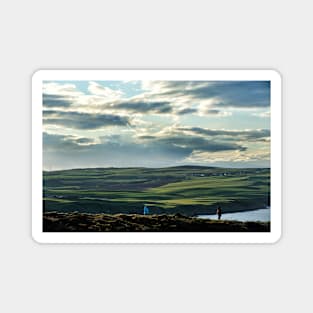 Walkers follow the path with views across the Mull of Galloway Magnet