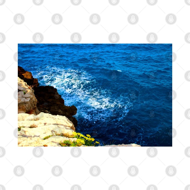 View from a high rocky coast of Polignano a Mare at the wavy Adriatic sea by KristinaDrozd