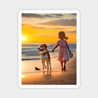 girl playing with a dog on the beach. Magnet