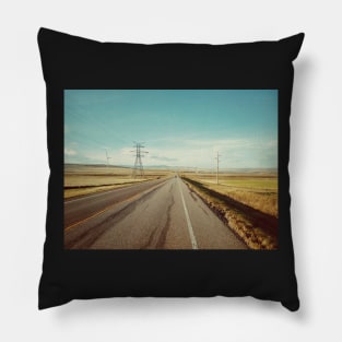 Canadian prairie landscape with a country road near Pincher Creek, Alberta, Canada. Pillow