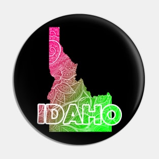 Colorful mandala art map of Idaho with text in pink and green Pin