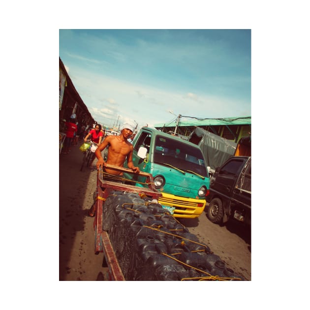 Filipino worker on a street market, Cebu city, Philippines. by Nalidsa