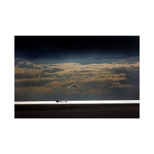 Sealight - clouds over The Wash as a ship moves along the coast near Hunstanton, Norfolk by richflintphoto