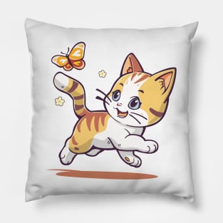 Kitten plays with a butterfly. Pillow